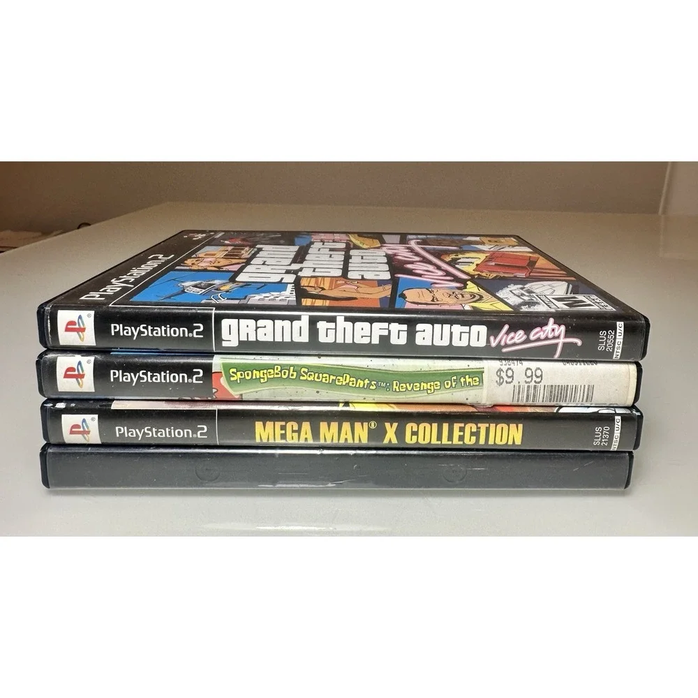Lot 4 DVD PlayStation 2 Megaman, MVP Baseball 2004, SpongeBob, Grand Theft Auto